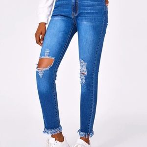 Ripped flare bottom jeans